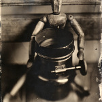Wooden Man with Lens